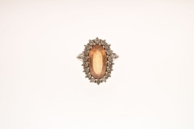 Lot 30 - Imperial topaz and diamond 18ct white gold cluster ring