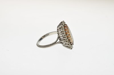Lot 30 - Imperial topaz and diamond 18ct white gold cluster ring
