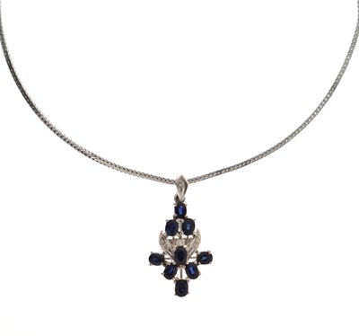 Lot 60 - Sapphire and diamond white metal cluster pendant necklace