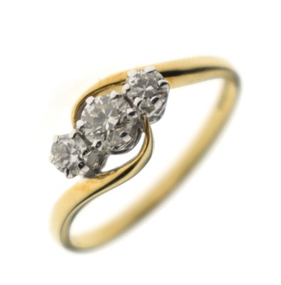 Lot 17 - Diamond three-stone 18ct gold ring