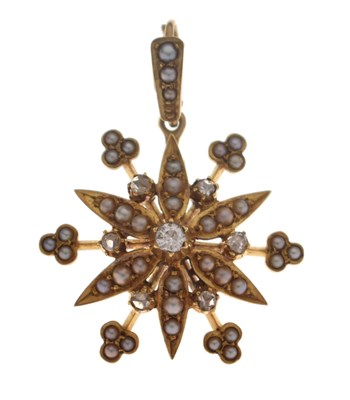 Lot 57 - Late Victorian / Edwardian seed pearl and diamond unmarked yellow metal pendant
