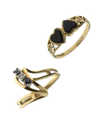 Lot 54 - 9ct gold onyx sweetheart ring, and a three-stone dress ring (2)
