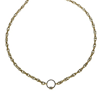 Lot 127 - Yellow metal rope twist necklace with an integral diamond set circular pendant