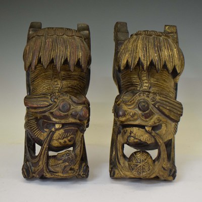 Lot 635 - Pair of Chinese carved gilt softwood Dog of Fo finials