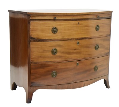 Lot 787 - Late George III mahogany bowfront chest of drawers with brushing slide