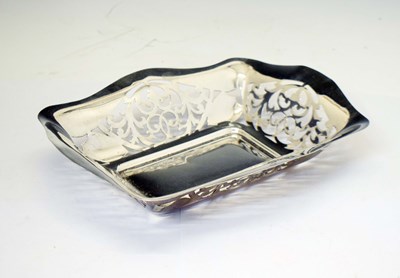 Lot 252 - George V silver basket of shaped rectangular form