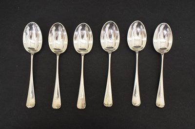 Lot 272 - Set of six George V silver Old English pattern and Rat Tail dessert spoons