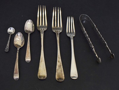 Lot 278 - Assorted silver flatware to include: a pair of silver Feather Edge pattern table forks, etc