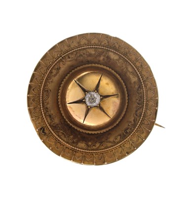 Lot 47 - Victorian diamond unmarked yellow metal target brooch