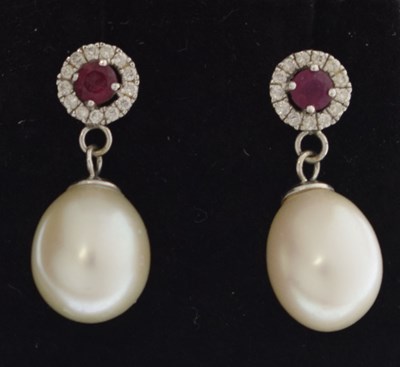 Lot 152 - Pair of ruby, diamond and cultured pearl 9ct white gold drop earrings
