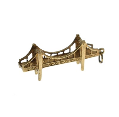Lot 144 - 9ct gold suspension bridge charm