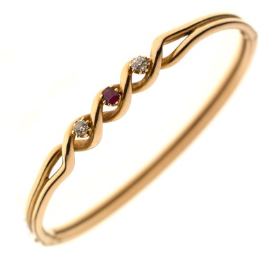 Lot 84 - Edwardian ruby and diamond 15ct yellow gold hinged bangle
