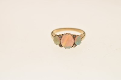 Lot 35 - Opal three stone unmarked yellow metal ring