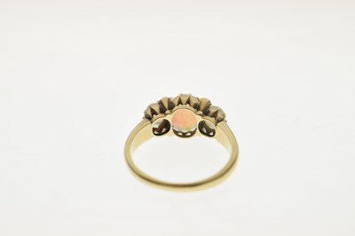 Lot 35 - Opal three stone unmarked yellow metal ring
