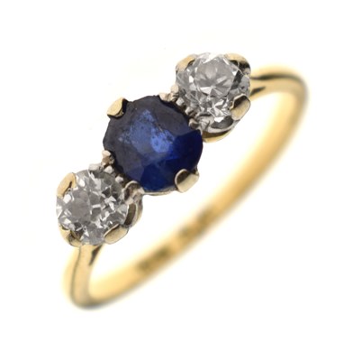 Lot 19 - Sapphire and diamond three stone 18ct yellow gold and platinum set ring