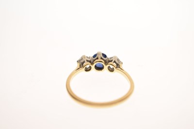 Lot 19 - Sapphire and diamond three stone 18ct yellow gold and platinum set ring
