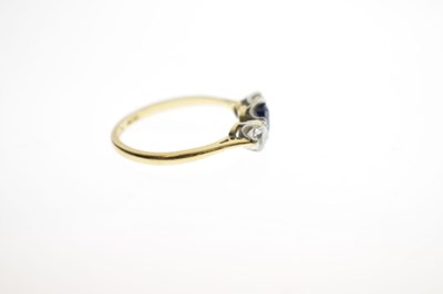 Lot 19 - Sapphire and diamond three stone 18ct yellow gold and platinum set ring