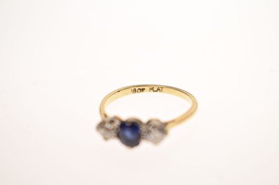 Lot 19 - Sapphire and diamond three stone 18ct yellow gold and platinum set ring