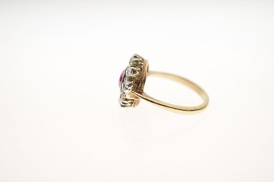 Lot 17 - Early 20th century ruby and diamond 9ct gold cluster ring