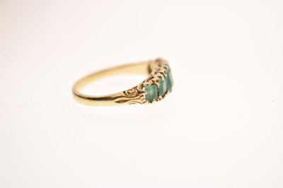 Lot 23 - Late Victorian / Edwardian emerald and diamond yellow metal ring
