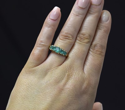 Lot 23 - Late Victorian / Edwardian emerald and diamond yellow metal ring