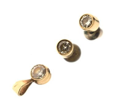 Lot 166 - Pair of diamond stud earrings, and a matching diamond pendant