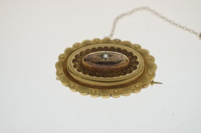 Lot 46 - Victorian diamond yellow metal oval target brooch