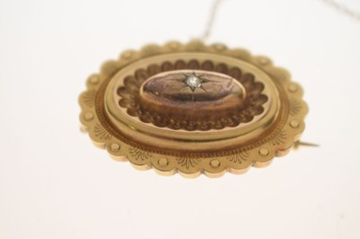Lot 46 - Victorian diamond yellow metal oval target brooch