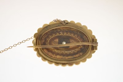 Lot 46 - Victorian diamond yellow metal oval target brooch