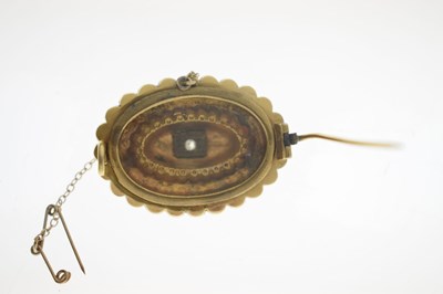 Lot 46 - Victorian diamond yellow metal oval target brooch