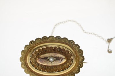 Lot 46 - Victorian diamond yellow metal oval target brooch