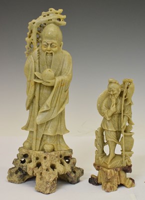 Lot 633 - Two Chinese carved green soapstone figures