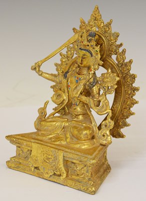 Lot 632 - Tibetan gilt alloy figure of Manjushri