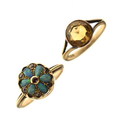 Lot 53 - Two gem-set yellow metal dress rings