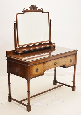 Lot 808 - Early 20th century walnut kneehole dressing table and matching swing dressing mirror (2)