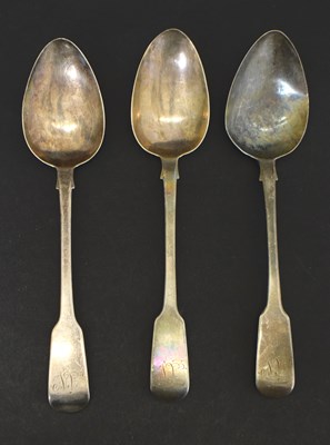 Lot 285 - Set of three George IV Fiddle pattern silver table spoons