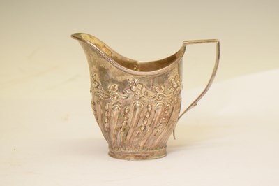 Lot 243 - Late Victorian silver cream jug with floral and fluted decoration