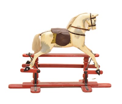 Lot 475 - 20th century child's painted wooden rocking horse