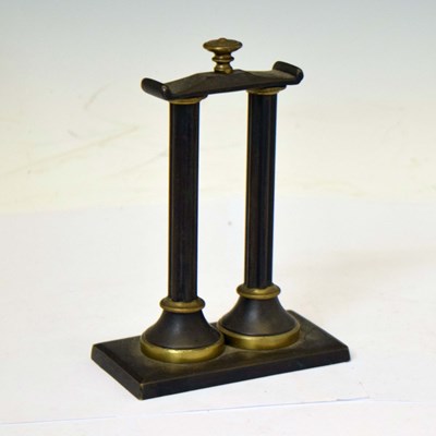 Lot 395 - Early 20th century bronze watch stand in the form of two classical pillars