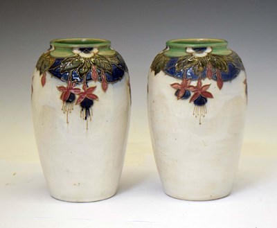 Lot 597 - A pair of early 20th century Royal Doulton stoneware vases