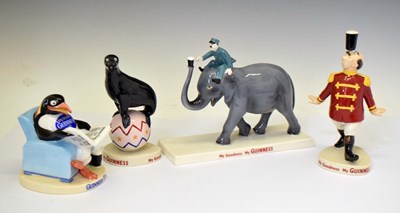Lot 583 - Four Coalport and Royal Doulton limited edition Guinness advertising figures