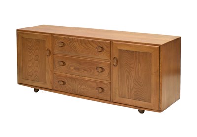 Lot 723 - Ercol Windsor model 455 light elm sideboard