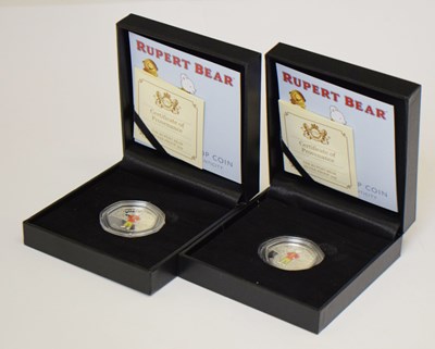 Lot 314 - Two Isle of Man - Elizabeth II silver proof 50p coin celebrating Rupert Bear, 2020