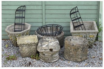 Lot 828 - Six composition stone garden planters together with two hanging baskets and two wall brackets