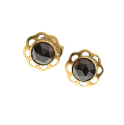 Lot 155 - Pair of yellow metal (585) and garnet ear studs