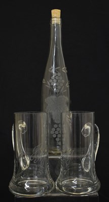 Lot 563 - Attibuted to Laurence Whistler (1912-2000) - Etched glass bottle and two etched tankards