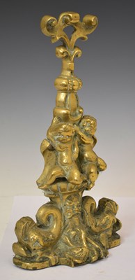 Lot 292 - 19th century brass door porter in the form of two cherubs on a fountain