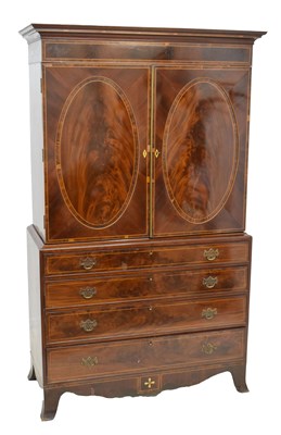 Lot 579 - George III inlaid mahogany linen press