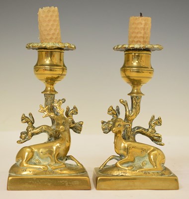 Lot 294 - Pair of 19th century brass candlesticks decorated with stags