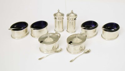 Lot 80 - Suite of eight George V silver condiments